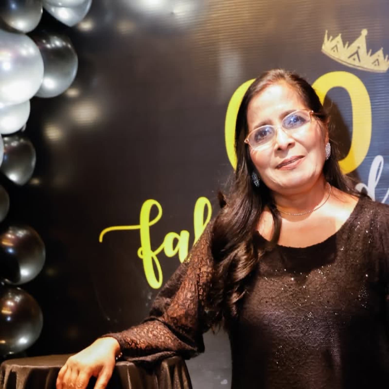 The guest of honour smiling at her 60th birthday celebration